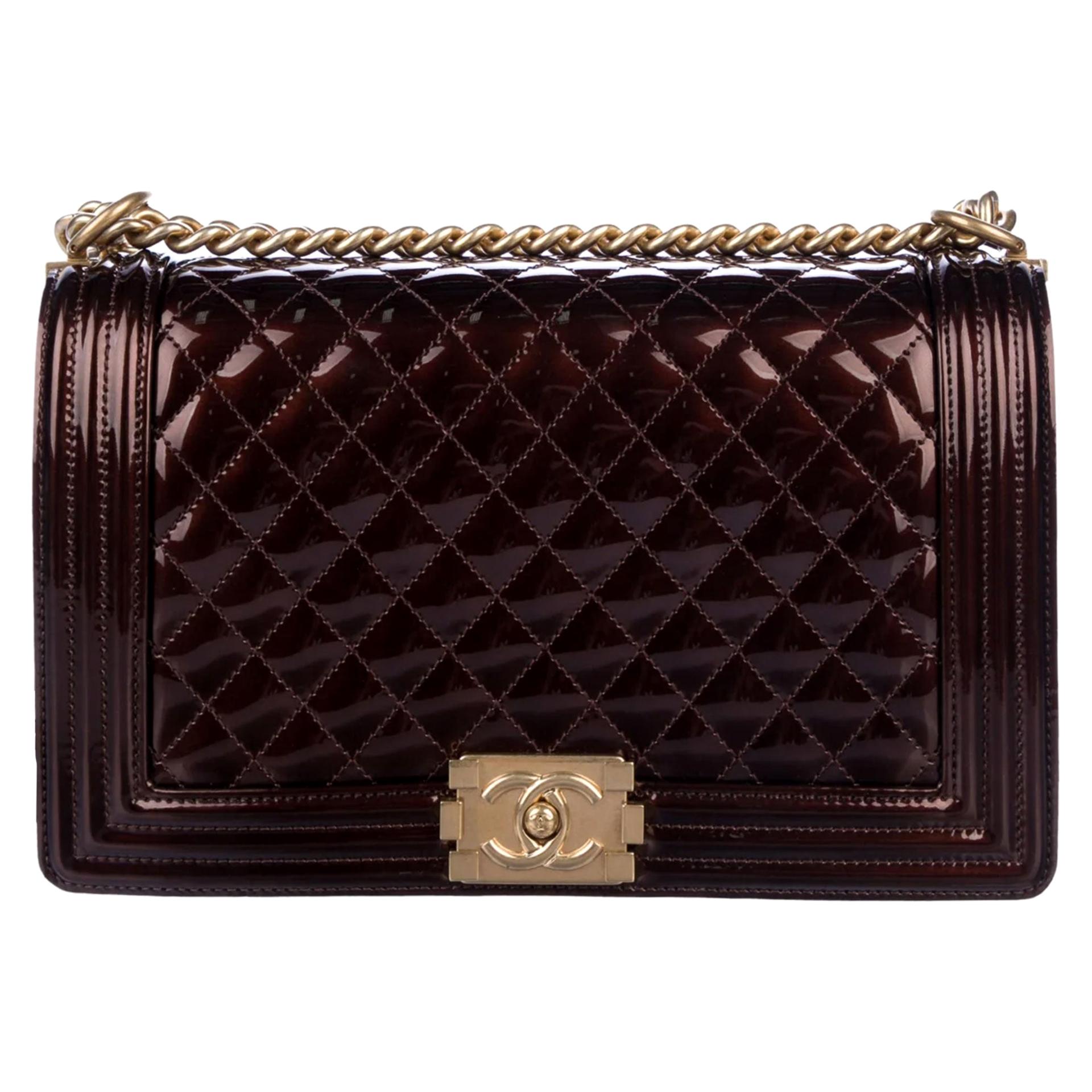 Rent  Chanel  Boy Chanel handbag in black lambskin  goldtone metal   BAGROMANCECOM